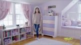 a woman in the white and pink theme room