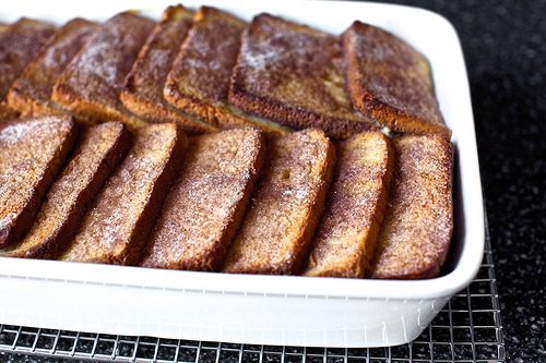 French toast in a baking dish on a cooling rack.
