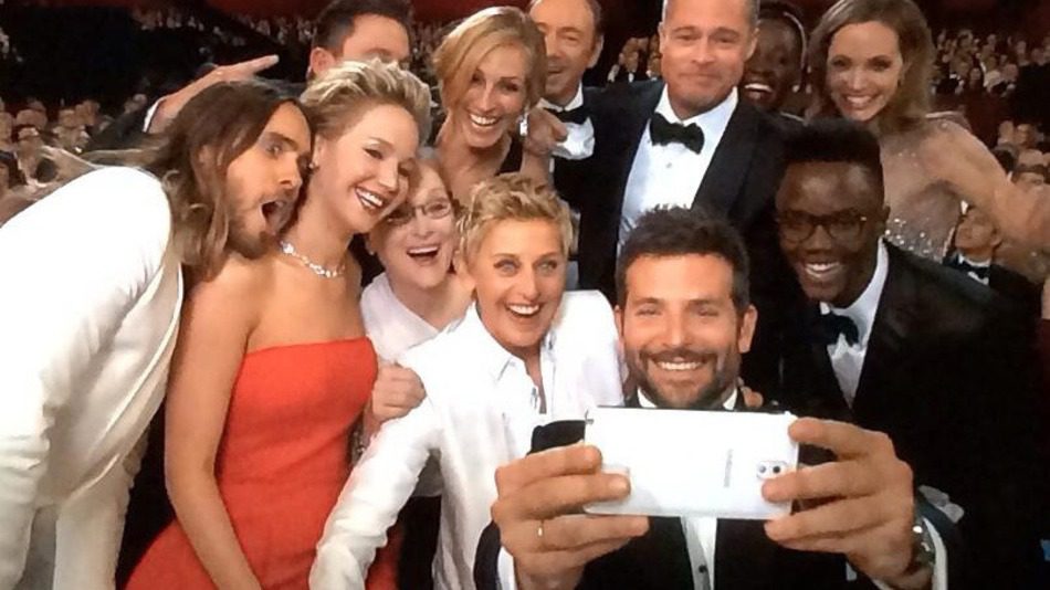 A group of people taking a selfie at the oscars.
