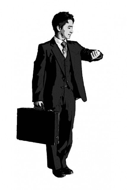 A black and white drawing of a man holding a briefcase.