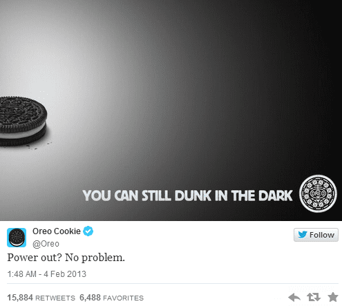 An oreo cookie on a black background with the words you can't dunk in the dark.