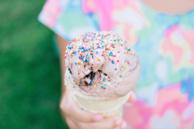 Close up image of an ice cream with some sprinkles