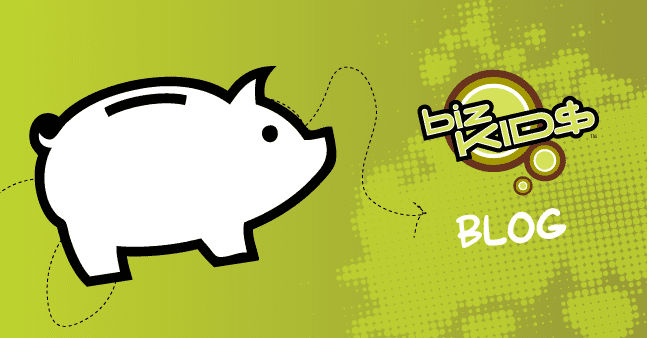 A piggy bank on a green background with the words'kids blog'.