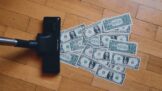 Dollars on the floor and a mop