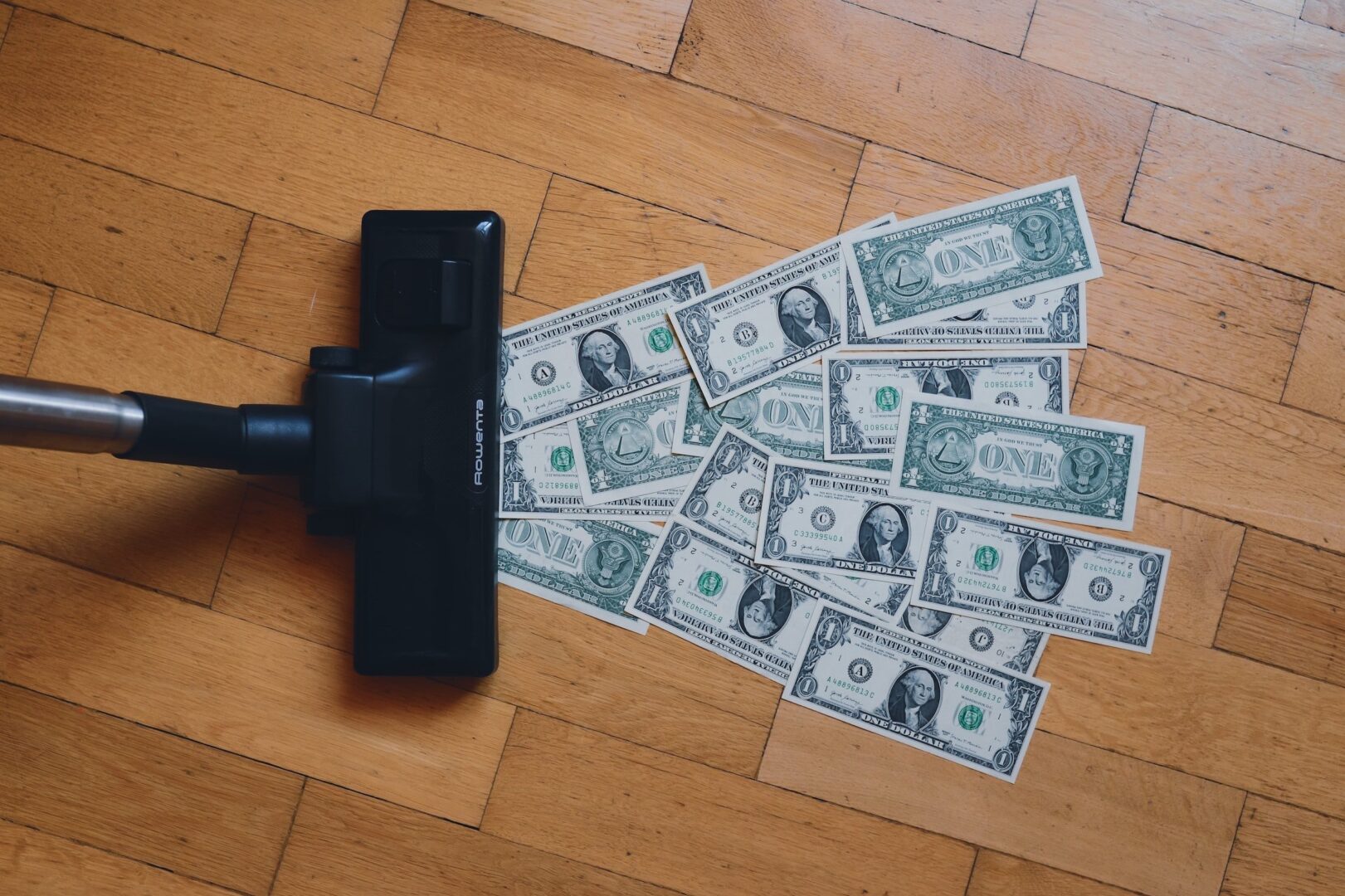 Dollars on the floor and a mop